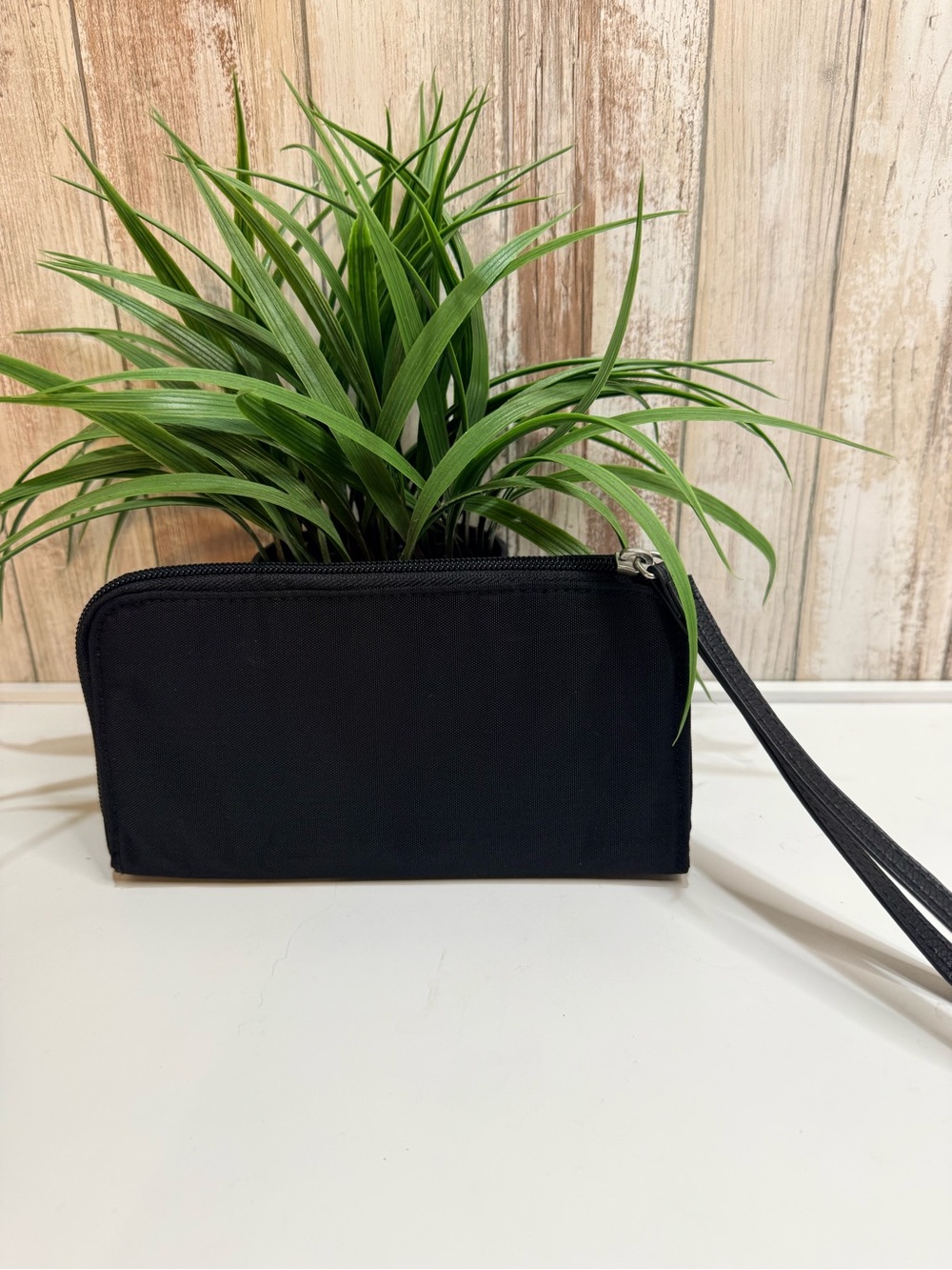 Baggallini Zip Around Wallet featuring a wrist strap and RFID protection, Black - Picture 2 of 8